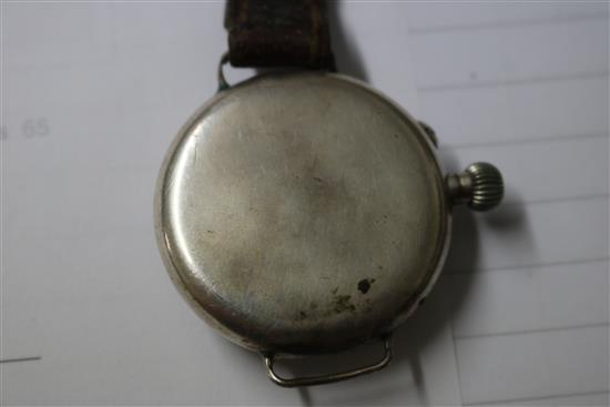 A ladys gold Rolex Precision watch and two other watches.
